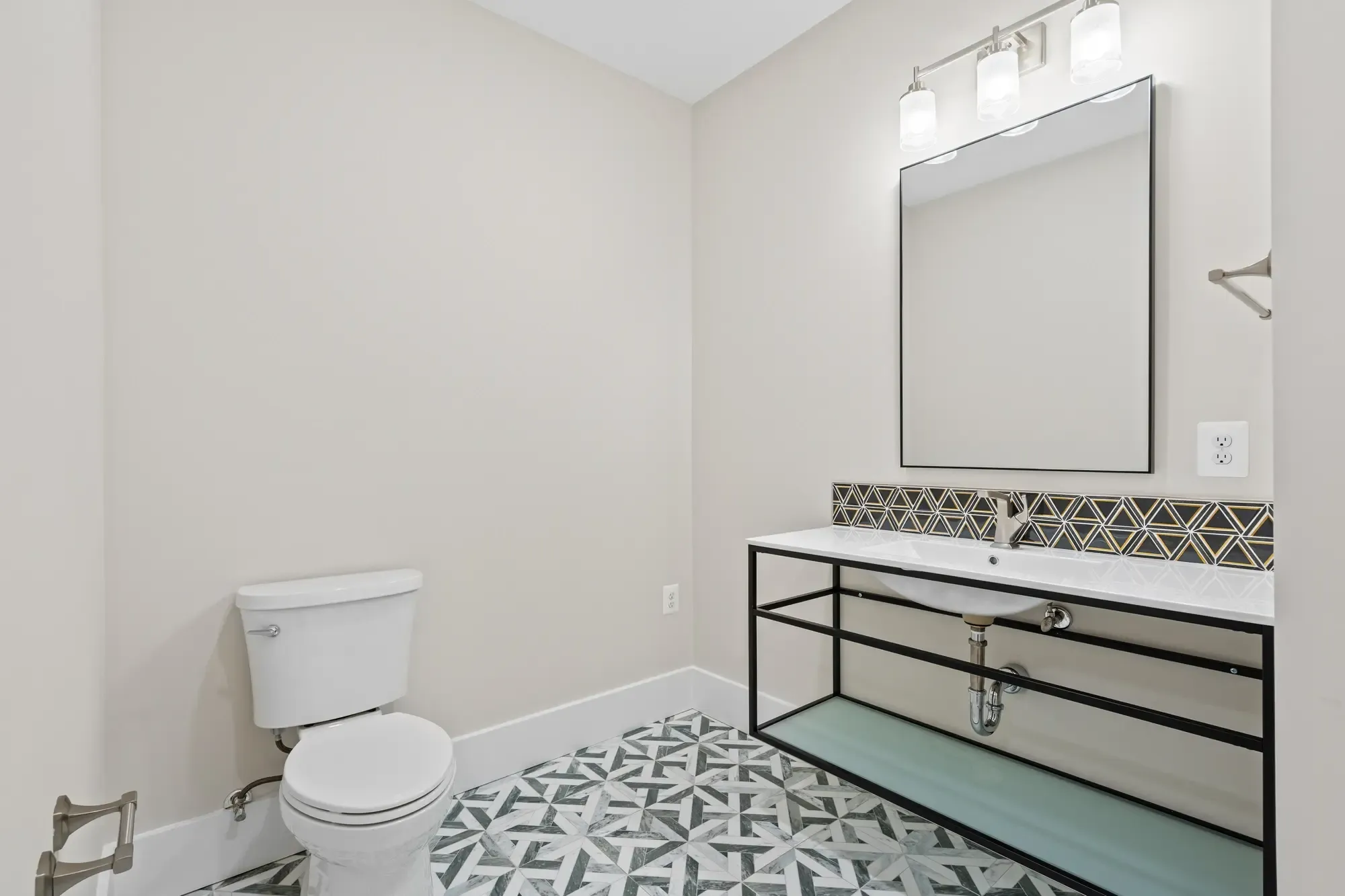 Large walk-in closet with built-in shelving and clothing rods