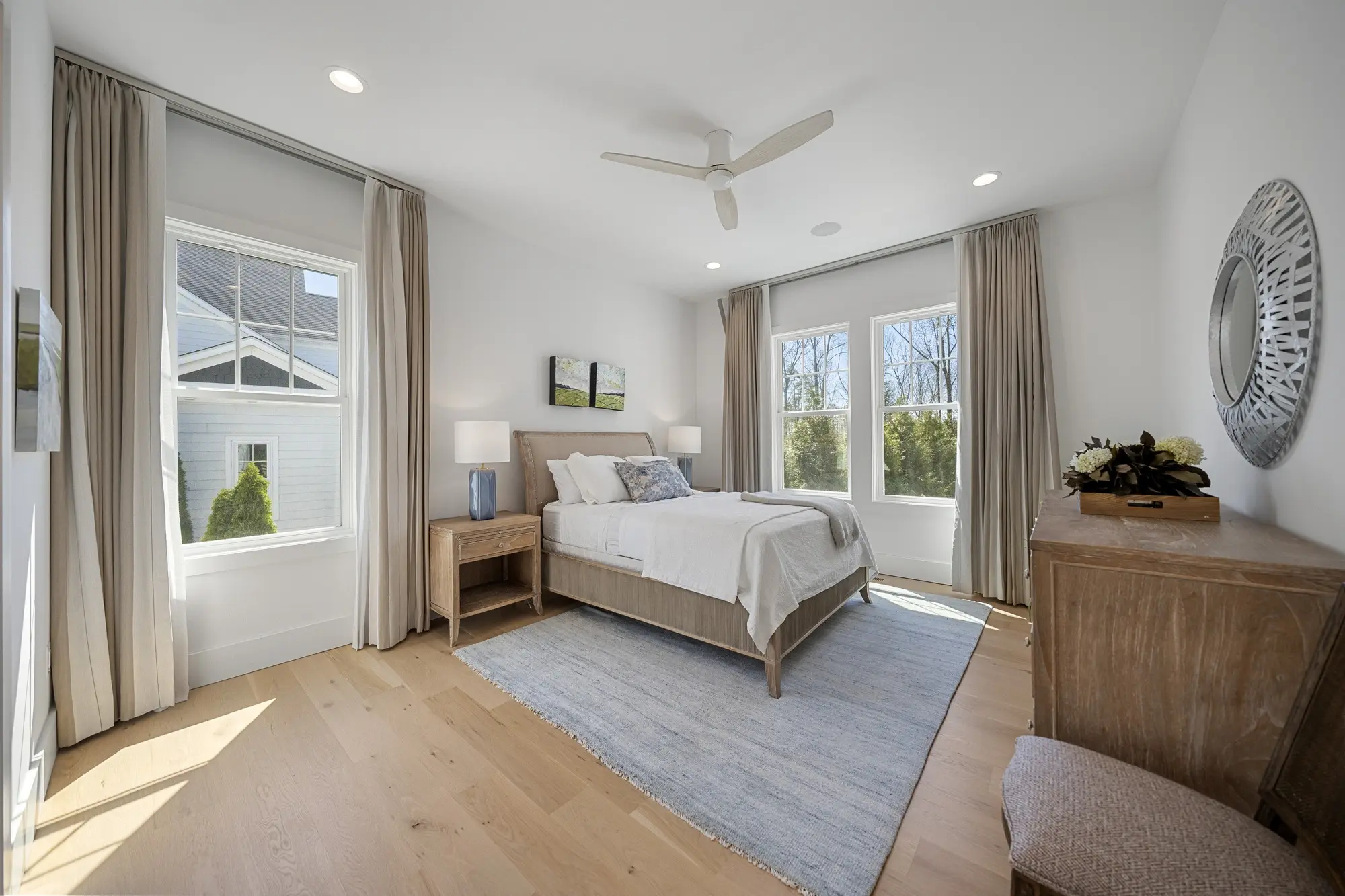Home office with custom built-in cabinetry and natural light