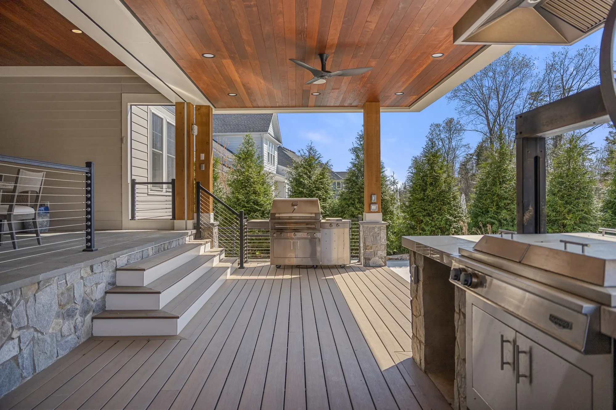 Primary suite with sitting area and garden views